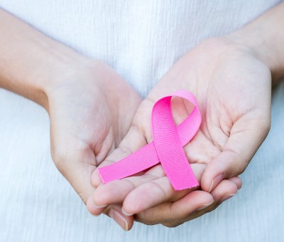 October,Breast,Cancer,Awareness,Month,,Adult,Woman,Hand,Holding,Pink